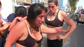 8. Topless protesters clash with police in Peru