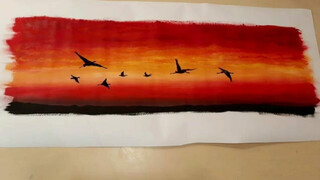 watercolour sunset with cranes