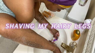 Shaving my hairy legs in the sink..