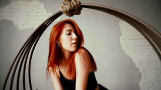 8. Beautiful, red-haired girl posing