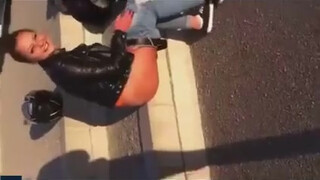 2. Biker girl shit on the street