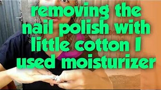 removing nail polish with little cotton