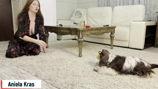 9. Aniela plays with her dog