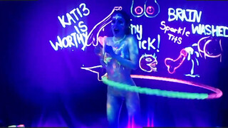 4. Neon Body Paint Hula Hoop Dance