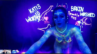 6. Neon Body Paint Hula Hoop Dance