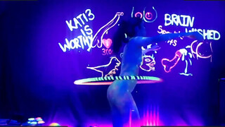 7. Neon Body Paint Hula Hoop Dance