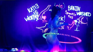 8. Neon Body Paint Hula Hoop Dance