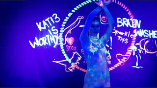 10. Neon Body Paint Hula Hoop Dance