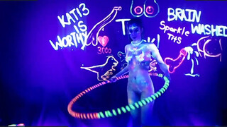 3. Neon Body Paint Hula Hoop Dance