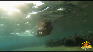 1. Girl swims underwater in fins and snorkel (Девушка плавает под водой в ластах и маске с трубкой)