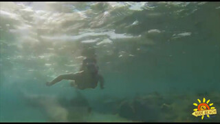 2. Girl swims underwater in fins and snorkel (Девушка плавает под водой в ластах и маске с трубкой)