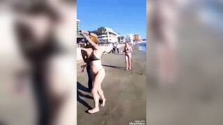 9. Micro bikini my two friends dancing on the beach