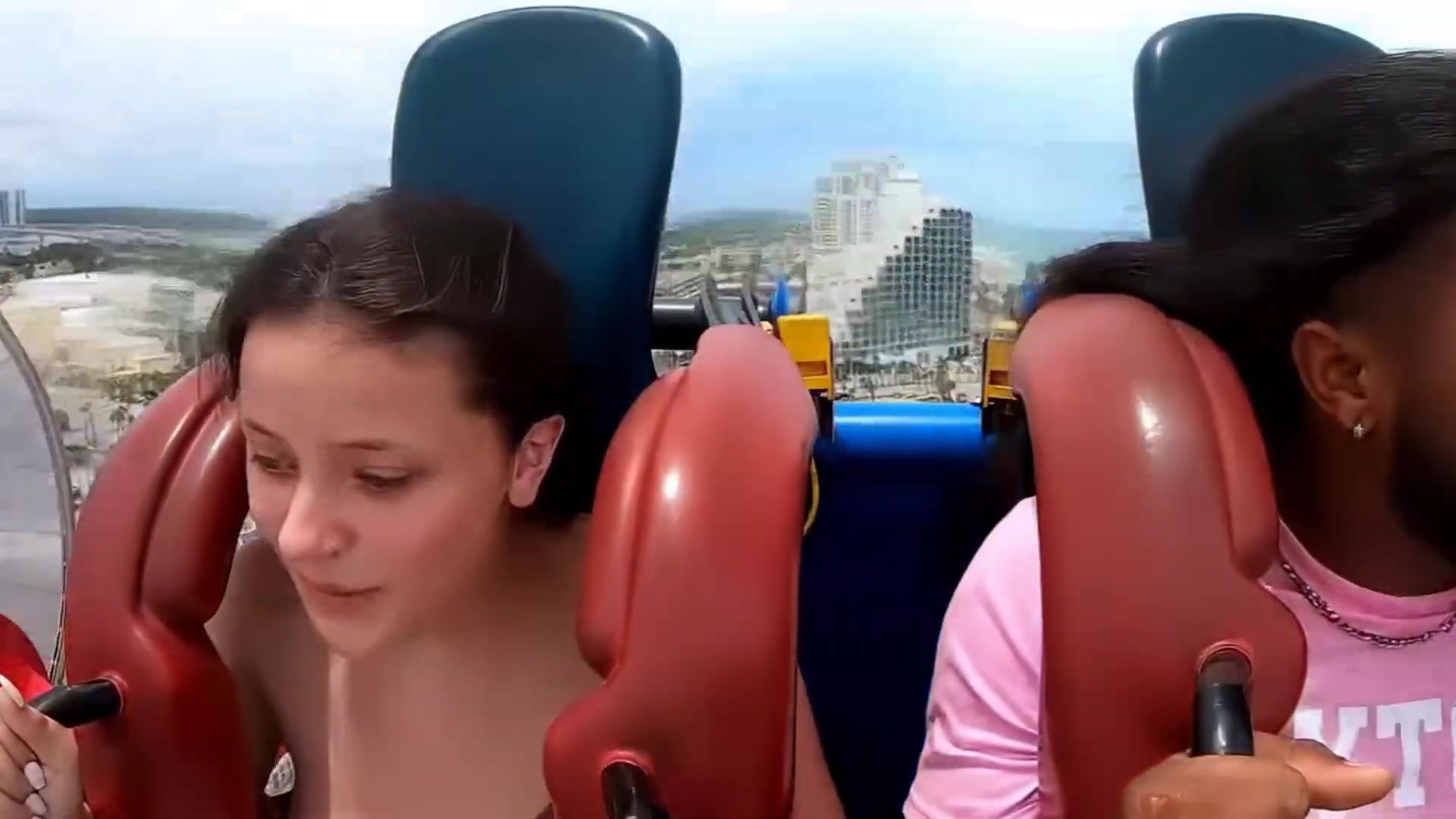Hold on tight! nip slips on the sling shot ride